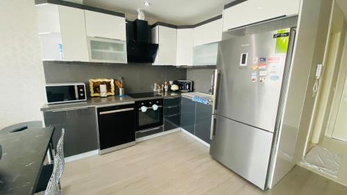 A kitchen or kitchenette at Luxury 2 Room Suite Apartment With Seaview In Center