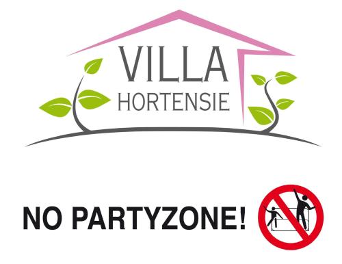a cartoon house with a sign that reads no party zone at Villa Hortensie in Aachen