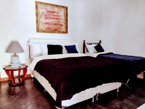 Uma cama ou camas num quarto em Rancho Zé Valentim