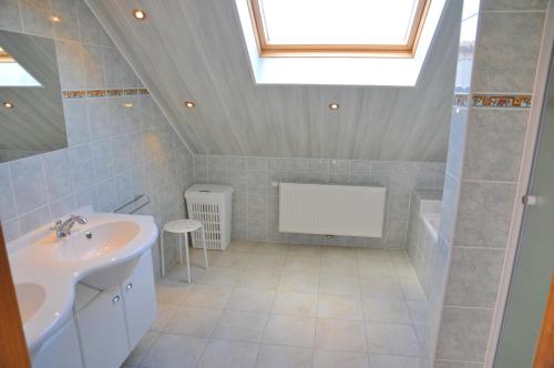 Kylpyhuone majoituspaikassa Gite Le Bonheur