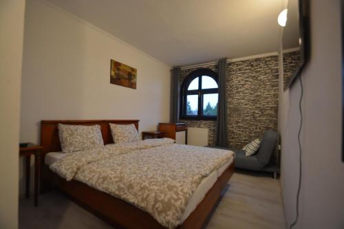 Postel nebo postele na pokoji v ubytování Gala - Guesthouse