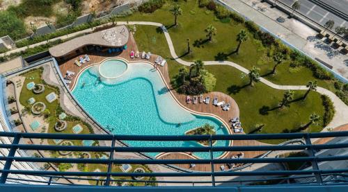 an aerial view of a pool in a resort at Luxury 2 Room Suite Apartment With Seaview In Center in Istanbul