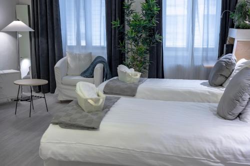 Postel nebo postele na pokoji v ubytování Hotel Lemonade
