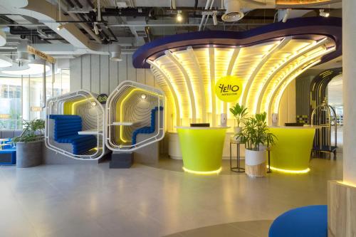a exhibit of a slide in a building at YELLO Hotel Kuta Beachwalk Bali in Kuta