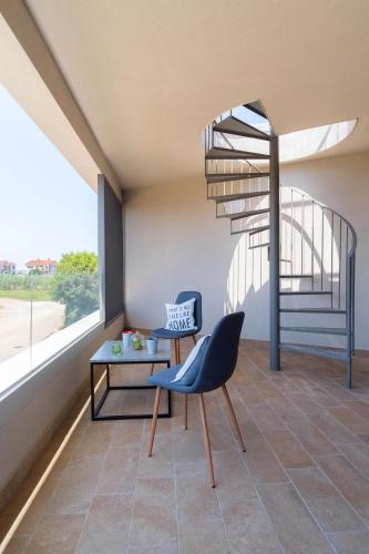 Un balcón o terraza en The Blueview Appartements Novigrad