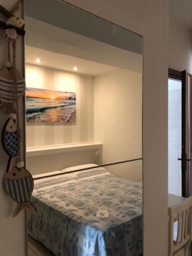 Katil atau katil-katil dalam bilik di Hotel La Rosetta Scauri