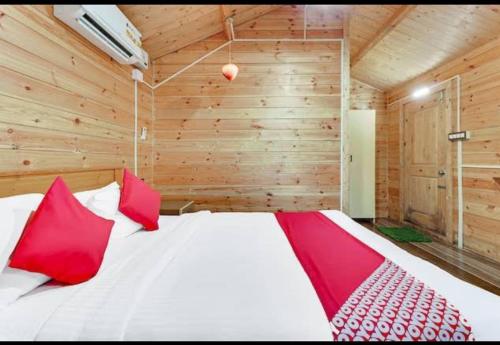 Postel nebo postele na pokoji v ubytování Coorg amodhini