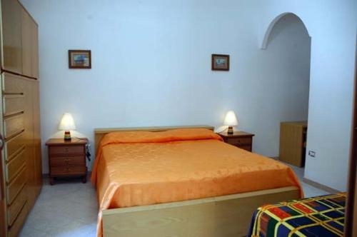 En eller flere senger på et rom på Villa Celeste Apartments Vieste -