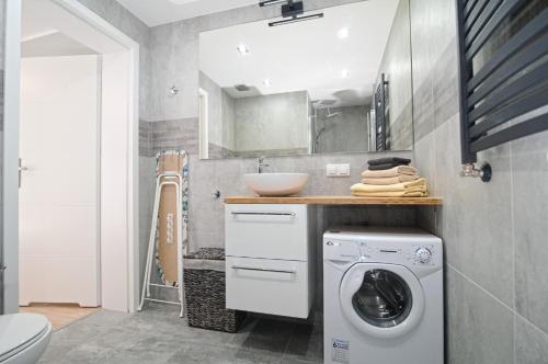 Et badeværelse på Apartamenty Bernardo Lux
