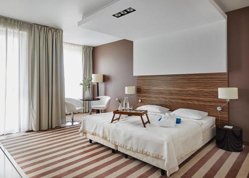 Posteľ alebo postele v izbe v ubytovaní Hotel Diva SPA