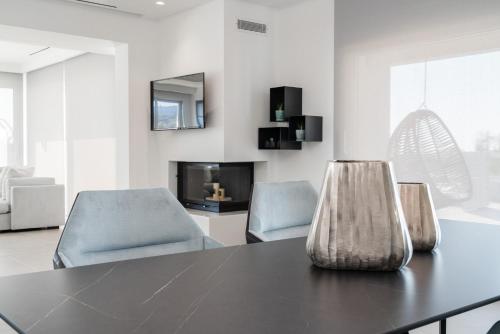 Balia Suitesにあるテレビまたはエンターテインメントセンター