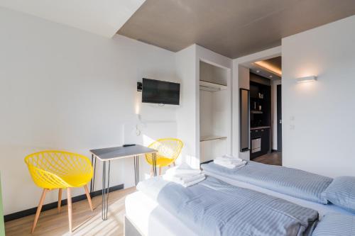 Tempat tidur dalam kamar di Nena Apartments - Kreuzberg 61