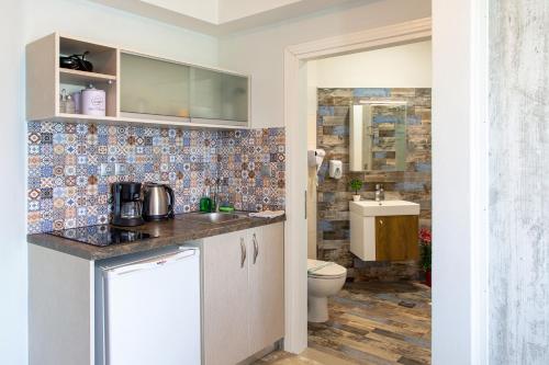 Koupelna v ubytování Elimia Suites & Studios