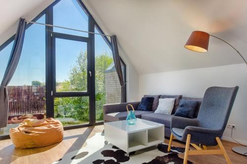 Ruang duduk di Fischerdorf Hafenloft (mit Meerblick)