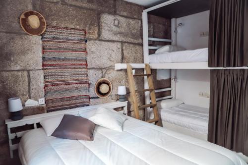Poschodová posteľ alebo postele v izbe v ubytovaní Villa 33