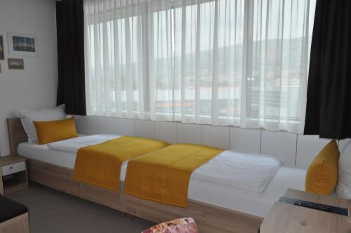 Katil atau katil-katil dalam bilik di Hotel Novitas Livno