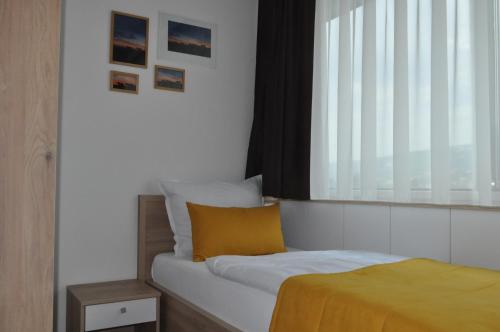 Katil atau katil-katil dalam bilik di Hotel Novitas Livno