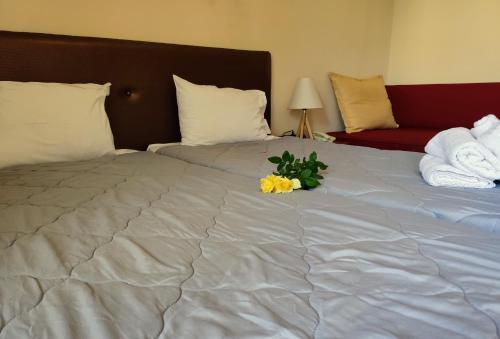 Postel nebo postele na pokoji v ubytování Hotel King