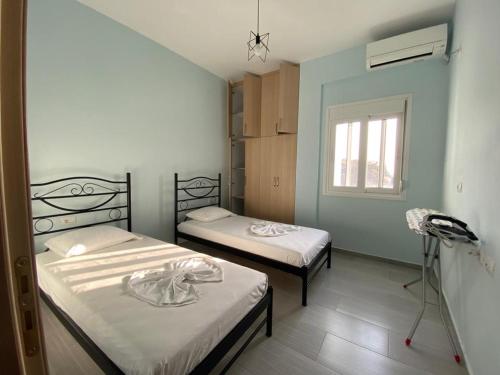 Katil atau katil-katil dalam bilik di Sunmoon Apartments