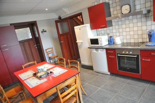 Kuchyň nebo kuchyňský kout v ubytování Gite Stone Lodge