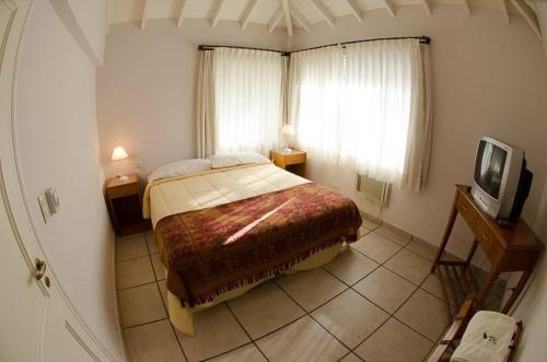 Apart Arbol del Cielo Cariló tesisinde bir odada yatak veya yataklar