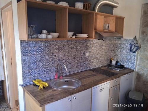 Kjøkken eller kjøkkenkrok på Agave apartments