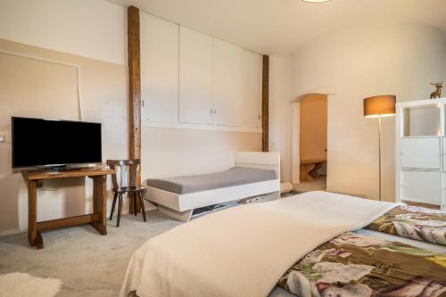 Hof zum Stadl - Ferienwohnung Nr 1 tesisinde bir odada yatak veya yataklar