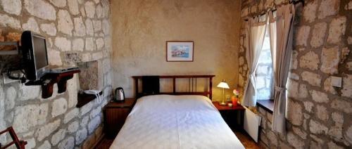 Postel nebo postele na pokoji v ubytování Cozy Room in a Boutique Hotel near Popular Attractions of Cesme