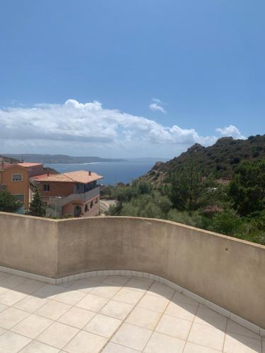 a view of the ocean from a balcony of a house at Casa vacanze Nebida in Nebida