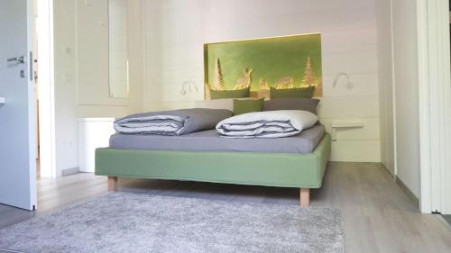 Postel nebo postele na pokoji v ubytování Casa Zignon - Vezzano