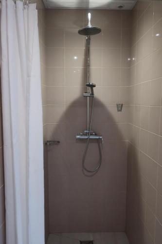 Ванная комната в Kapsuła Hostel