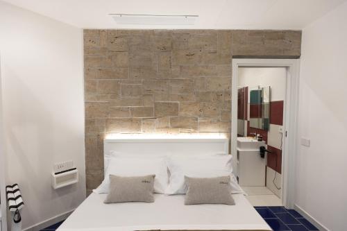 Postel nebo postele na pokoji v ubytování Anreale Rooms Paestum