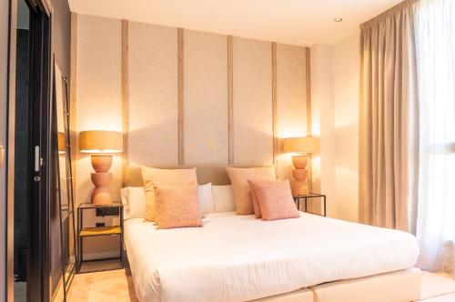 Кровать или кровати в номере Valencia Luxury - Sea Port II