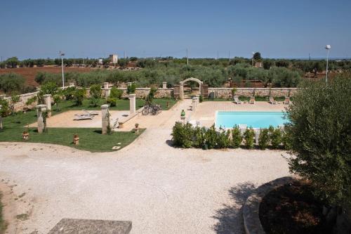 an aerial view of a garden with a swimming pool at TERRA TERRA - Masseria Minunni in Conversano