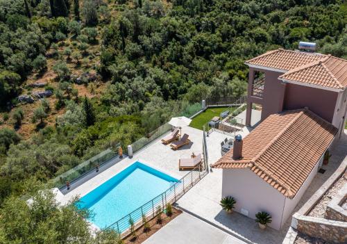 an aerial view of a villa with a swimming pool at Koumaries Villas in Lygia