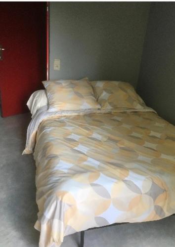 מיטה או מיטות בחדר ב-Chez nous.