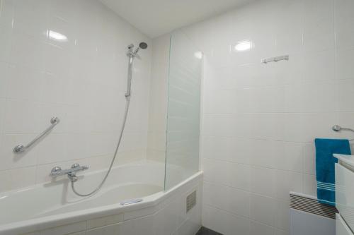 Ванная комната в Waddenresidentie Ameland