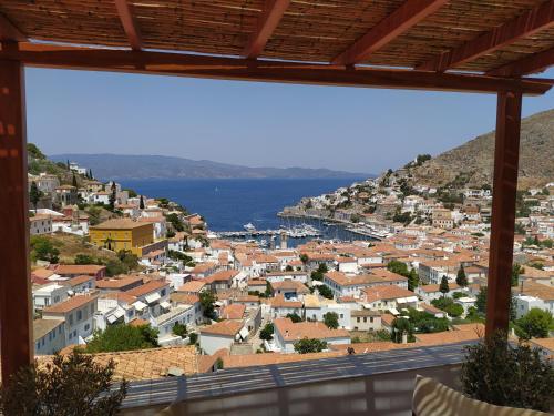 a view of a city from a hill at Hydra's View House in Hydra