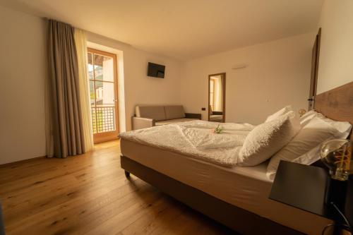 Katil atau katil-katil dalam bilik di Agritur La Crucola