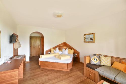 Postel nebo postele na pokoji v ubytování Hotel Paradies