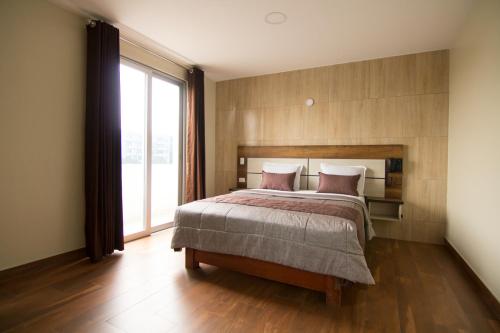 Una cama o camas en una habitación de Martinika