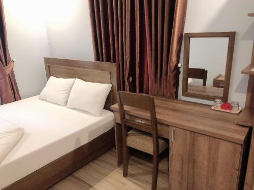 Katil atau katil-katil dalam bilik di Binh Duong 2 Hotel