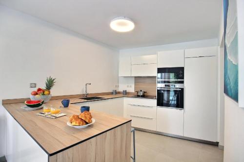 Cuisine ou kitchenette dans l'établissement Villa Lili