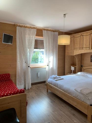 Postel nebo postele na pokoji v ubytování B&B La Ceresara