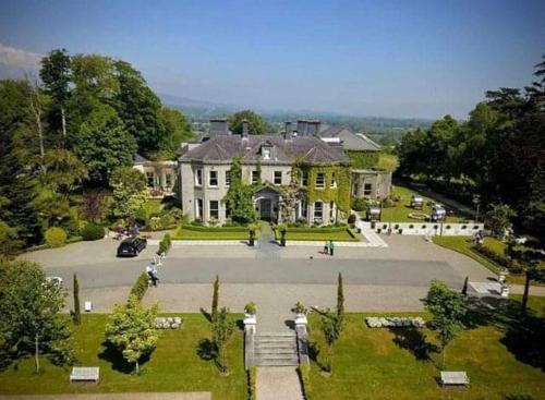 an aerial view of a large house with a courtyard at Tinakilly Country House Hotel in Rathnew