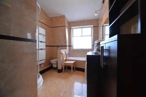 Koupelna v ubytování CITYSTAY Parkur Sopot Apartment