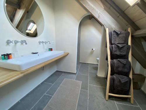 Ett badrum på Guesthouse Graaf Jan