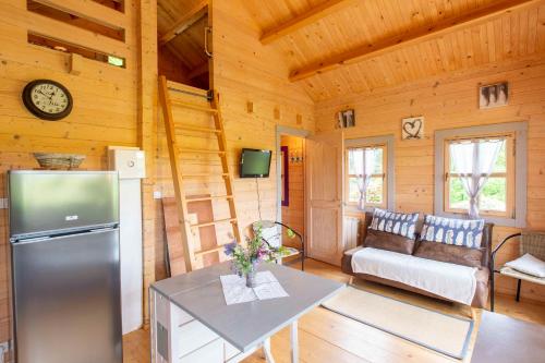 Televisyen dan/atau pusat hiburan di Chalets du Bois de Vache