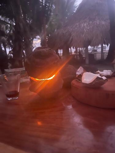 a blurry picture of a table with a drink on it at älanacasadeplaya in San Bernardo del Viento