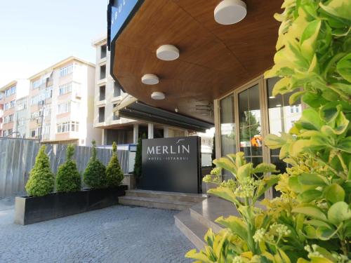 a building with a sign on the front of it at Merlin Hotel İstanbul in Istanbul